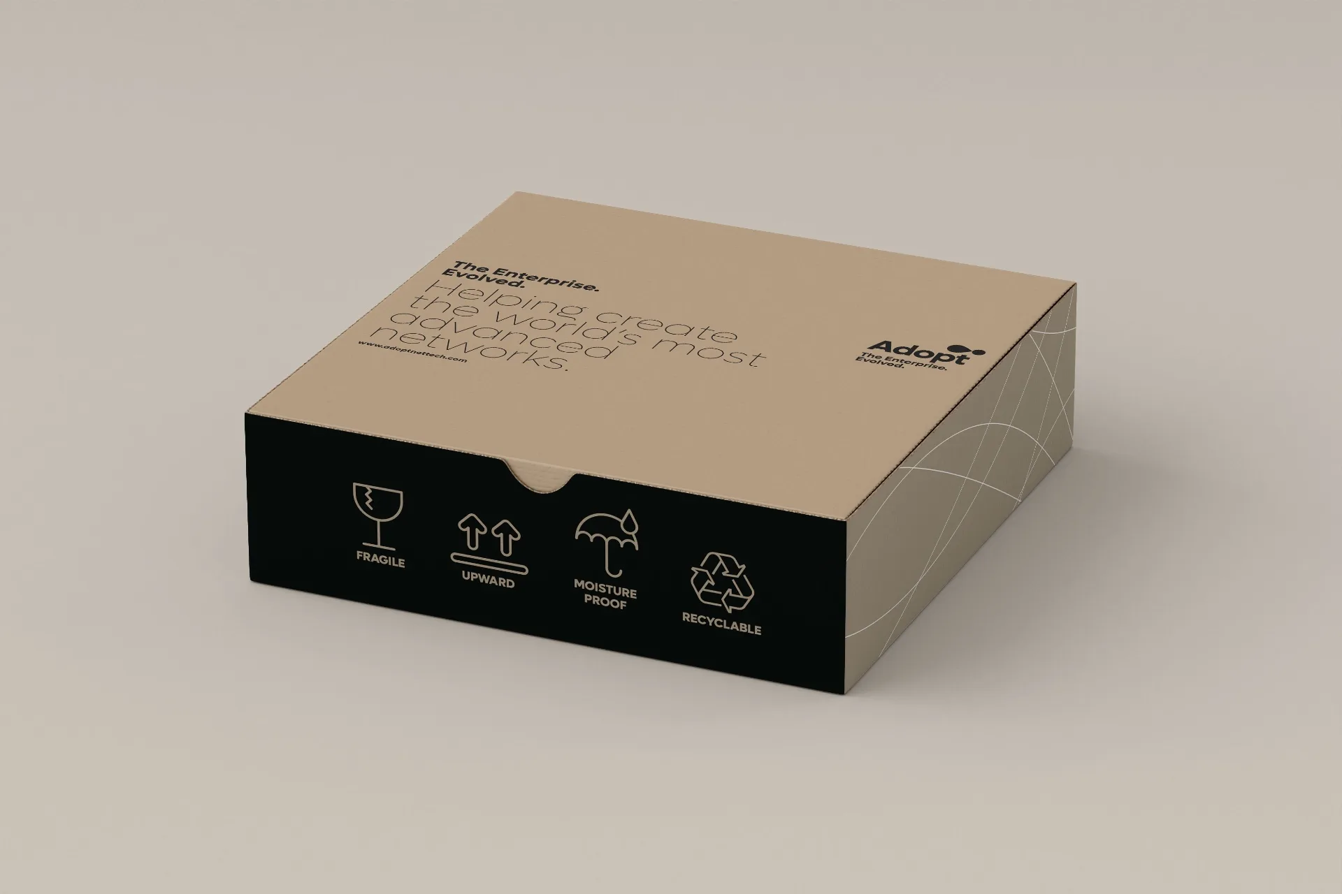 ADOPT - Product packaging box in beige with black side panel showing handling icons