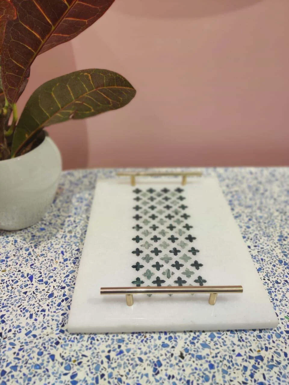 BFT Home marble tray with engraved pattern on terrazzo surface with plant
