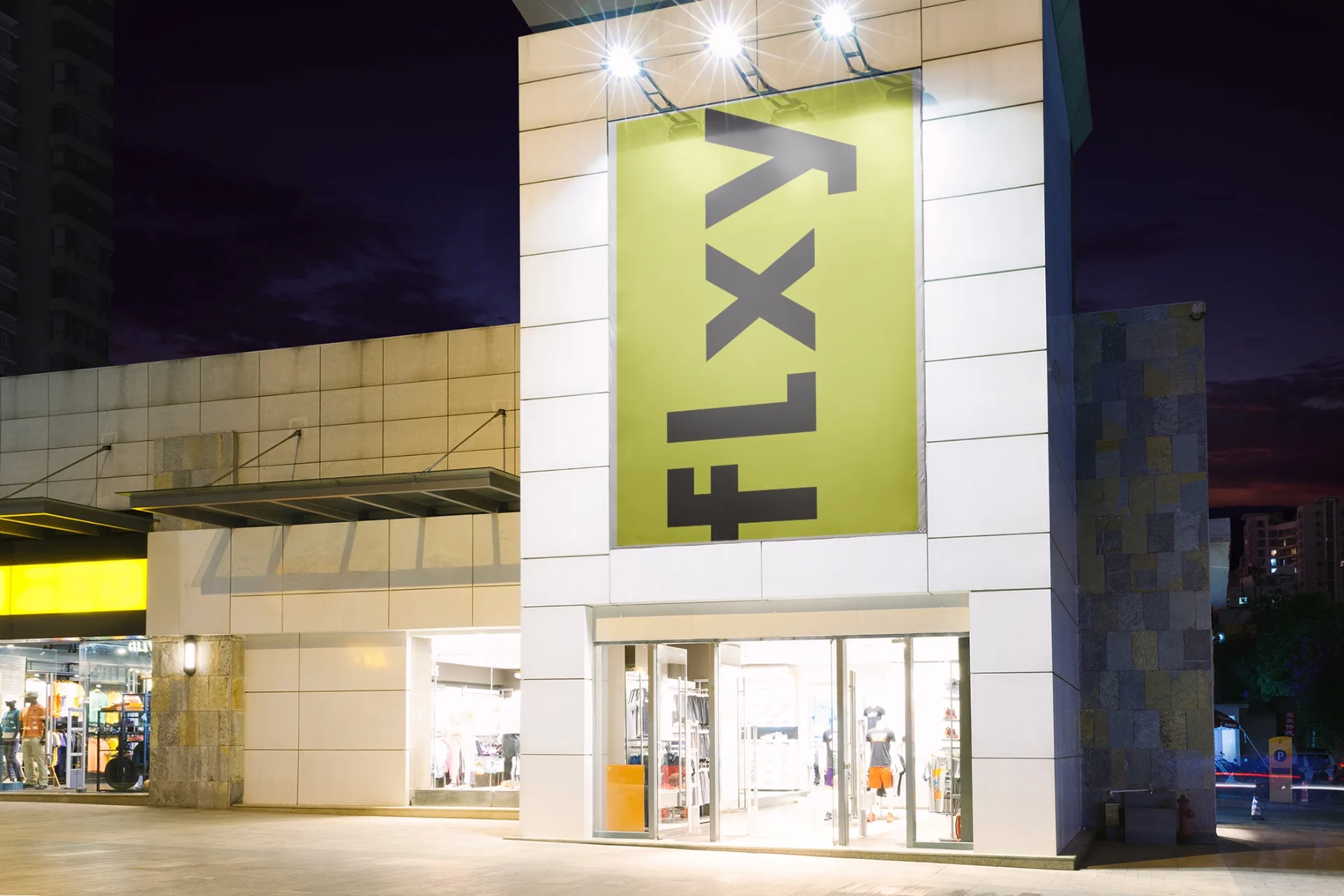 FLXY - Interior wayfinding signage with lime green accents
