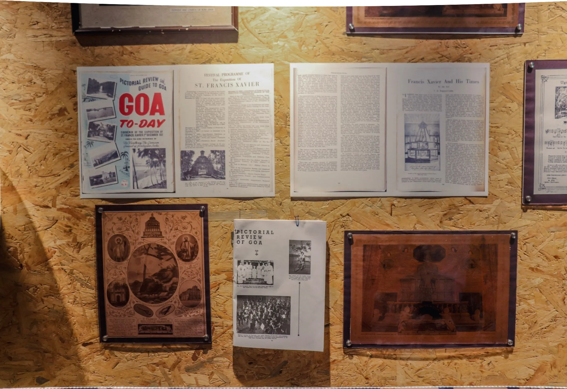 GOA FAMILIA - Historical documents and vintage Goa memorabilia displayed on wooden panel