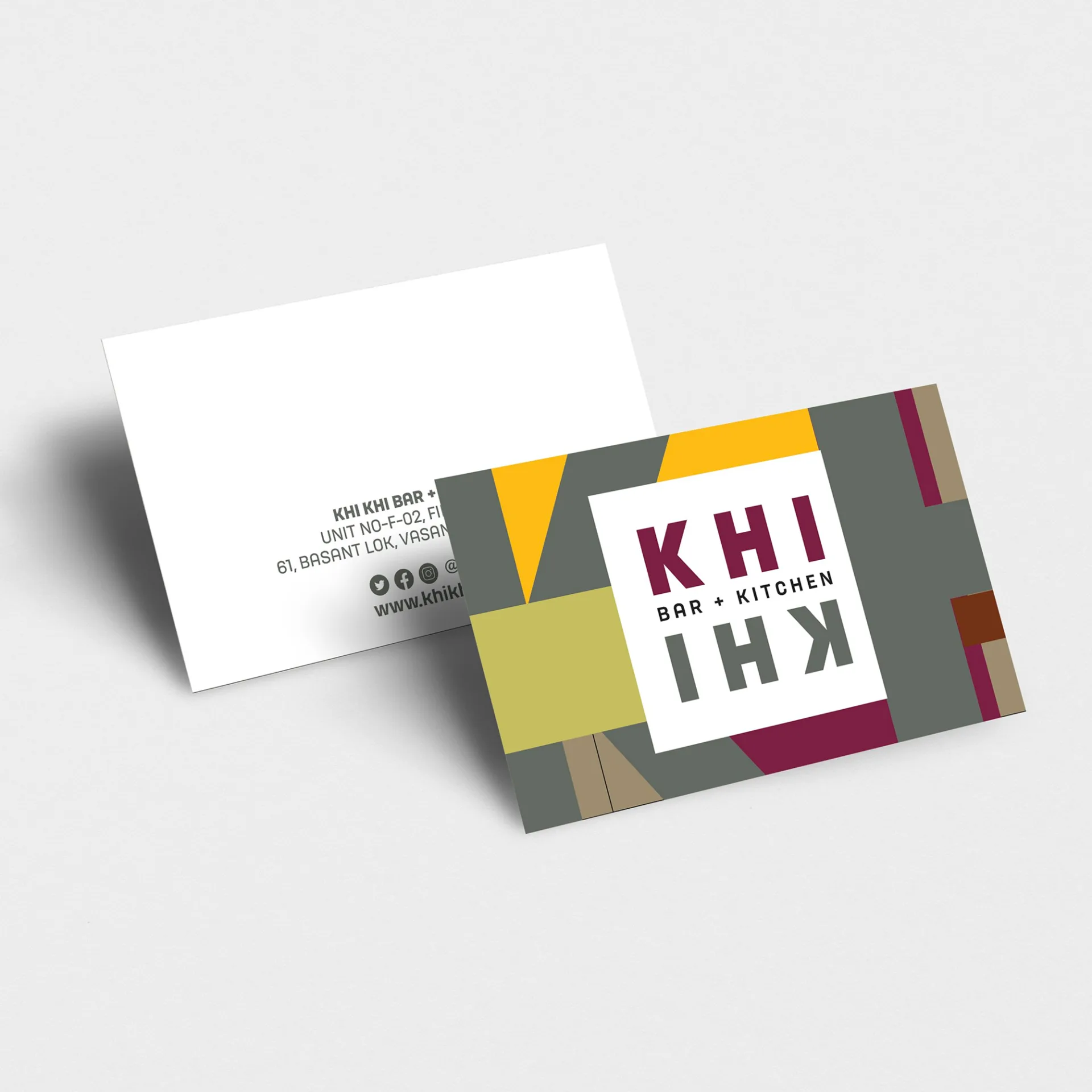 KHI KHI business cards design featuring geometric color blocks and brand logo with contact information