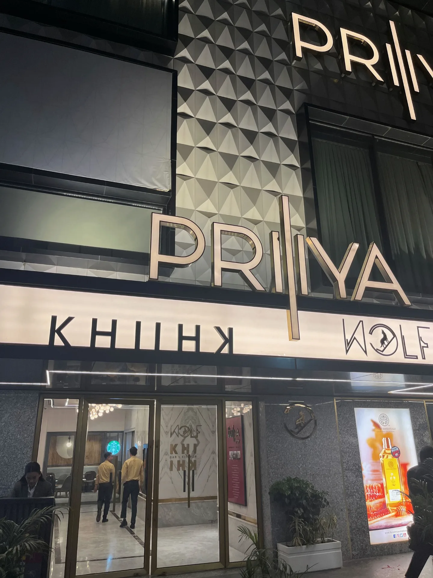 KHI KHI restaurant exterior storefront with PRIYA signage and modern architectural design